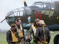  - Mitchell bomber crew chatting after a rough mission - by Alex Smit
