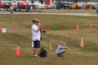  - Pick your spot and enjoy the show - Airventure 2009. - by Bob Simmermon