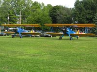  - N9HY (L) and N49711 (R) at the EAA fly-in - by Bob Simmermon
