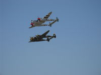  - 'Wings Over Camarillo' Airshow 2009-two Lockheed Lightning P-38s-NL7723C and NX138AM '23 Skidoo' - by Doug Robertson
