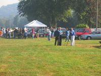  @ Riverside Airport - News crew checking out the EAA fly-in breakfast and Young Eagles event. - by Bob Simmermon