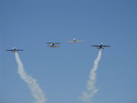  - Vicki Cruse Memorial Missing Woman Flight; aerobatic aircraft-the biplane will turn away. - by Doug Robertson
