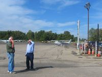  - Fuel pumps on the north end of the ramp.  Yeah, yeah, that's Don & Bill again. - by Bob Simmermon