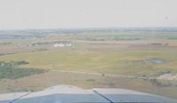  - On final to runway 5 at Glenwood, MN. Some windshield cleaning needed? I think so! - by Kreg Anderson