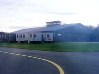  - looking back at the main hangar at Welshpool with the old tower on top - by Chris Hall