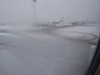  - A snow-stormy day at the Warsaw Airport - by Erdinç Toklu