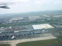  - Just took off for Dubaï from 08 at Roissy CDG. Terminal 1 in the background. - by Erdinç Toklu