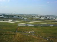  - Landing on 08R. See the central and north towers. - by Erdinç Toklu