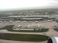  - Roissy CDG Terminal 2A,B,C,D. Climbing from 26L. C and A in front right to left, D and B in the back right to left. - by Erdinç Toklu