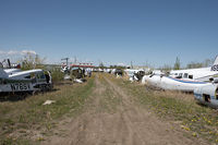  @ Edmonton/Villeneuve Airport (Villeneuve Airport) - Scrap yard at Edmonton Villeneuve  - by Andy Graf-VAP