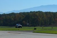  - Helicopter activity and the fuel truck. - by Bob Simmermon