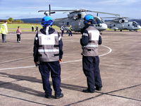  - Royal Navy Merlin ground crew  - by Chris Hall