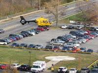 @ Medical Center Heliport - Looking east as N381PH arrives. - by Bob Simmermon
