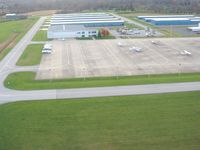  @ Indianapolis Metropolitan Airport - Departing RWY 15 looking SW at the FBO. - by Bob Simmermon
