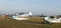  @ Grand Rapids/itasca Co-gordon Newstrom Fld Airport - The grass ramp, housing local planes, at the Grand Rapids Airport - by Kreg Anderson