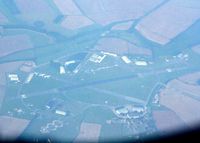  - Kemble seen from G-ECOM departing Southampton.  Far right are aircraft being scrapped, to left are stored BAe146 and 747s. - by Pete Hughes