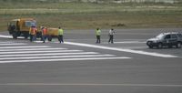  - Repairs being done on the tresh hold of runway 10 - by Daniel Jef