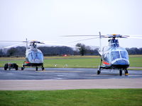  - ZR324 and ZR325 Agusta A-109E's of the Defence Helicopter Flying School - by Chris Hall