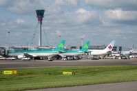  - Taxiing to Terminal 1 past the new control tower at London-Heathrow. - by Malcolm Clarke