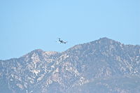  - SkyWest Bombardier CL-600-2C10, on approach to 31L KPSP. - by Mark Kalfas