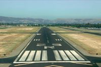  @ Livermore Municipal Airport - Short final, runway 25R. - by Chris Saulit