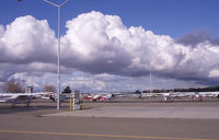  - Aircraft parking on the East Ramp. The Tower is on the left. - by Bill Larkins