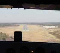  - Short final RWY02 at KDBN.  Notice gear up warning light?  Low approach. - by J. Michael Travis
