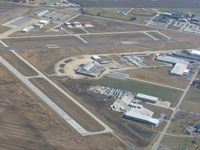  - Old terminal in the foreground with newer facilities beyond. - by Bob Simmermon