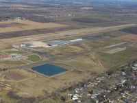  - Looking north, entering downwind for 21. - by Bob Simmermon