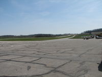  - Looking out onto runway 35 from the FBO entrance on the ramp. - by Sam Andrews