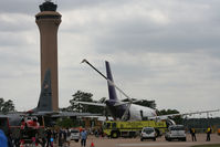  - The tower overlooks the festivities on the ground. - by Darryl Roach