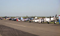 - The line-up of warbirds at North Weald during Air Show Europe in 1992. - by Malcolm Clarke