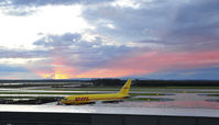  - Stormy sunset west of KIAD on 11/15/2008.  N775AX in the foreground. - by concord977