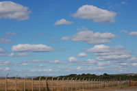  - Fair weather over the airport, a change from rain, haze and overcast - by Roger Winser