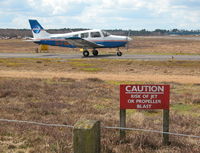  - PIPER PA-28-161 G-FNPT TAXYING TO RWY 25  - by BIKE PILOT