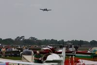  - OA-10A (81-0967) overflying the field during Sun N Fun 2010. - by Bob Simmermon