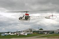  - A view across Bagby Airfield as Agusta G-GGTT prepares to put down. - by Malcolm Clarke