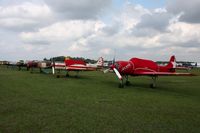 @ Lakeland Linder Regional Airport - Row of Yak's and Nanchang's at Sun N Fun 2010. - by Bob Simmermon