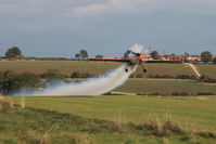  - Extra G-ZXEL takes off from Fishburn's 6 degree upslope making smoke. - by Malcolm Clarke