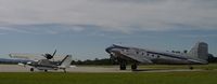  - DC-3 and Searay at KOPN fuel ramp. - by J. Michael Travis