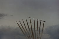  - The Red Arrows in 10 ship formation fly past over Swansea Airport on thier way to RAF Valley - by Roger Winser