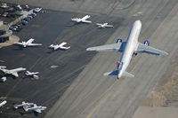  - Departure off John Wayne Airport - by Marty Kusch