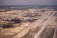  - DFW Airport under construction.  Old Kodachrome slide copied with Sony A200, - by Ron Streetenberger