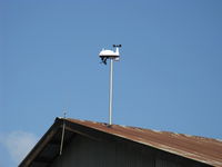 - Weather Station on hangar-solar powered. - by Doug Robertson