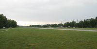  - A rainy July Saturday at the Breezy Point Airport. - by Kreg Anderson