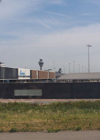  - This place is very busy.  I really enjoyed this location.  It is Aircraft Spotter friendly.  This location has many places to view the tarmac. - by J.B. Barbour