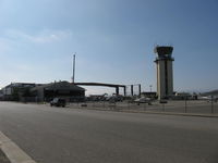 - Two new large hangars under construction near the Air Traffic Control Tower will add 45,000 square feet of space to SUN AIR JETS. - by Doug Robertson