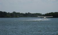  @ Elbow Lake Municipal - Pride Of The Prairie Airport - N31367, de Havilland DHC-2 Beaver giving rides on Worm Lake adjacent to Elbow Lake Municipal Airport during the LAPA Fly-in. - by Kreg Anderson