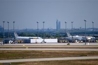  - View over 08R/26L to the AeroLogic corner and to Leipzig skyline. - by Holger Zengler