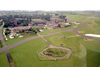 - Cranfield Airfield in August 1982. Contains an 'eerie' reflection of my daughter! - by Malcolm Clarke